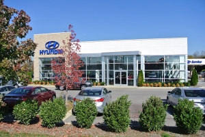 Even from the outside of this Hyundai dealership, you can still see the interior lighting.