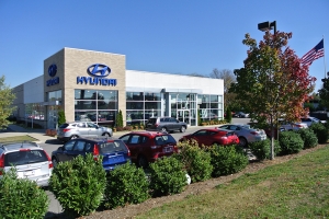 A diagonal view of a Hyundai car dealership where Rains Electric Company installed commercial lighting.