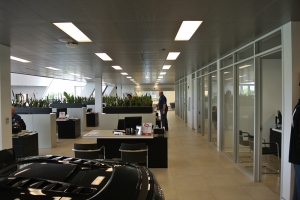 Employees at this Audi location near Detroit benefit from a modern office layout and lighting design.
